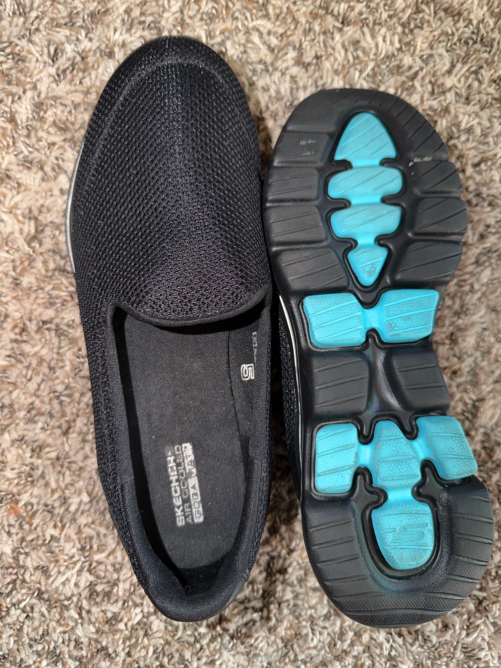 Skechers Women's Black Slip-On Sneakers with Turquoise Outsole Accents